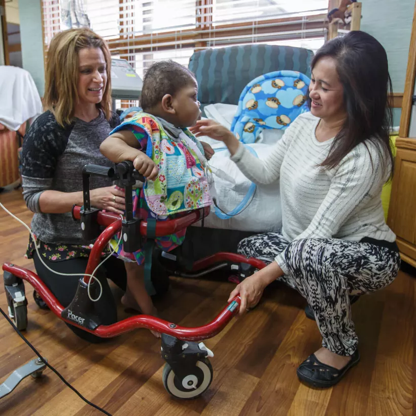 Healthcare Provider Assisting a Child