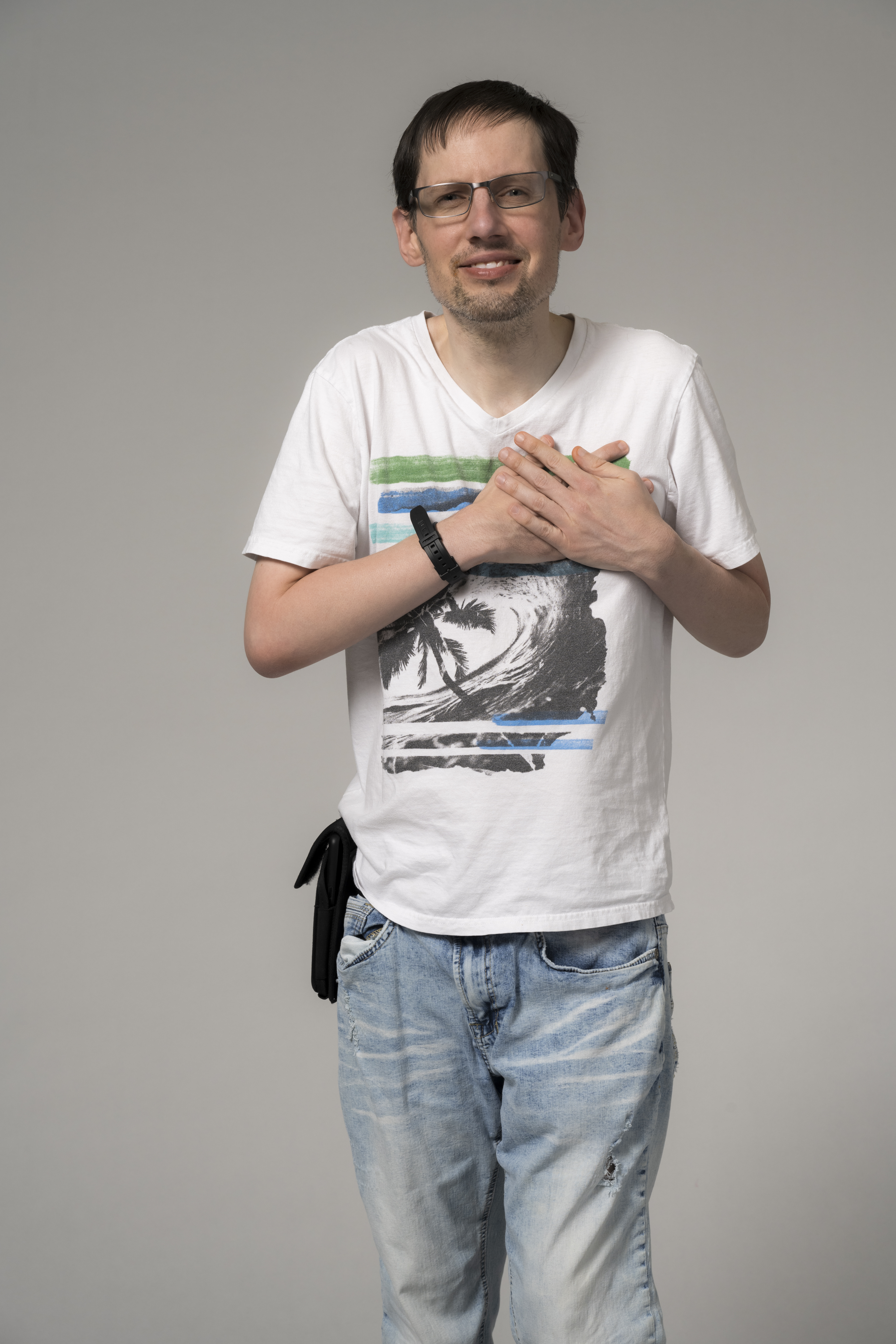 Randy Crosby smiling during a portrait