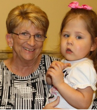 A tribute graphic titled “Sunshine Communities’ Shining Star” featuring a story about longtime nurse Linda Dittman alongside a photo of Linda holding a young child supported by Sunshine Communities.