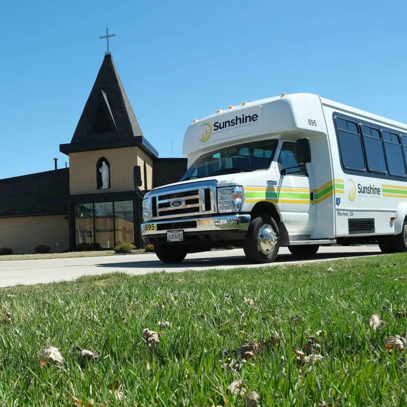 A Bus Next to a Church