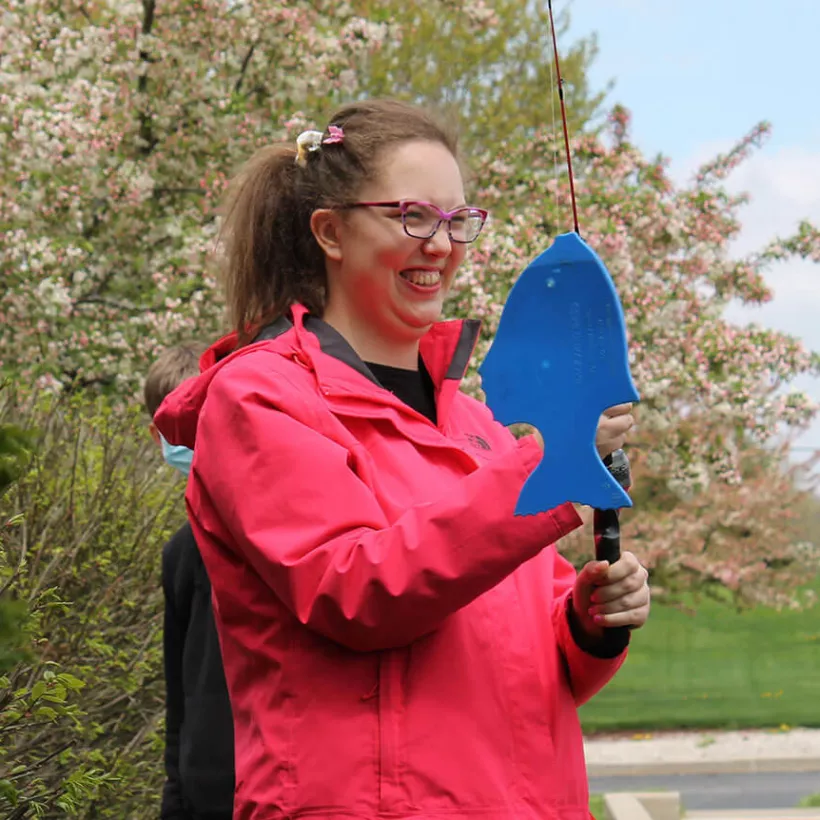 Person Playing with Felt Fish