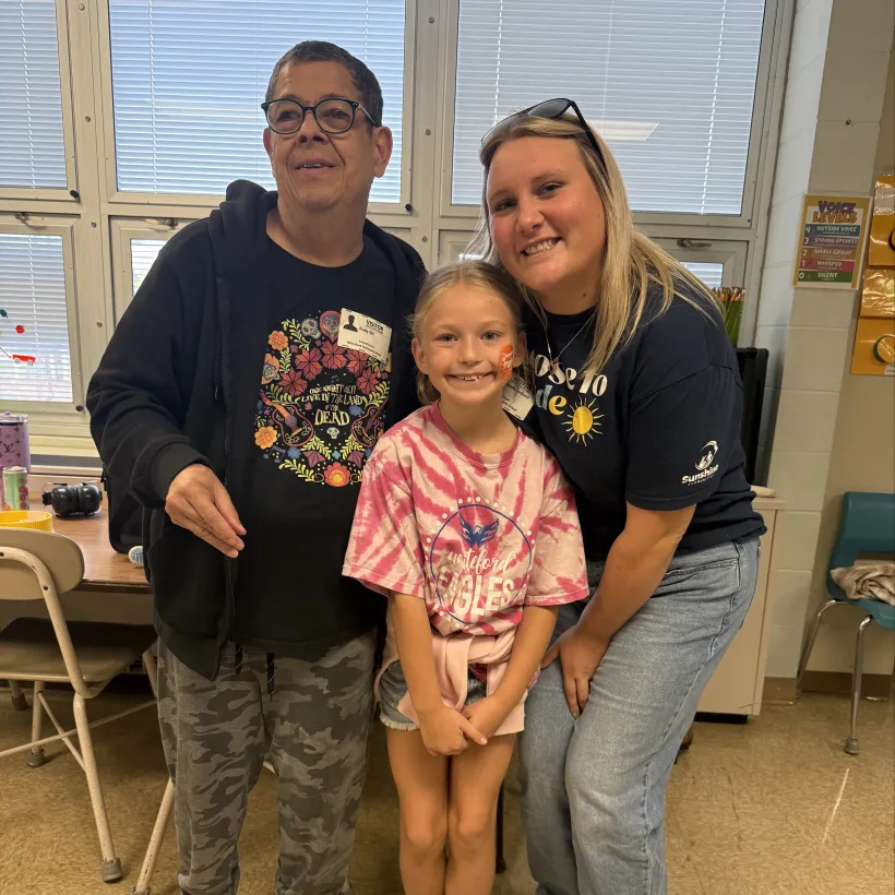 Sunshine Communities representatives and a student during an Ohio Tech Day hands-on learning experience.